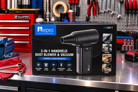 Aerpro APDBV1 2-in-1 handheld dust blower and vacuum in its retail box on a workshop bench